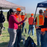 Hunter Outreach Assistance volunteers helping at field clinic.